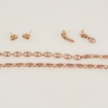 A 9 carat rose gold chain necklace and two pairs of earrings.