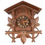 Stained and carved wood cuckoo clock,