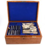 Edwardian oak canteen case, by Walker & Hall; and part canteen of cutlery