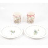 Two Wedgwood of Etruria Gilbert and Sullivan Operas Mugs, two Royal Worcester Mikado plates.