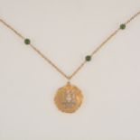 A Libra zodiac pendant on Prince-of-Wales link chain with green jadeite beads.
