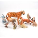 Beswick tiger and other animals and birds, and Wade Disney blow-ups.