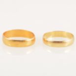 Two gold wedding bands, 22 carat and 18 carat.