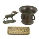 A small bronze mortar and two other items of metalware