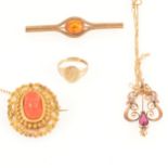 A collection of gold and yellow metal jewellery.