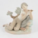 Lladro figure of a boy flautist