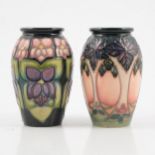 Moorcroft Pottery, 'Cluny' and 'Violets' vases, designed by Sally Tuffin, 1993.