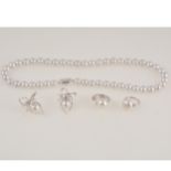 Gemporia - Four South Sea cultured pearl rings and one necklace.