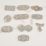 Ten Art Deco clear paste set brooches,