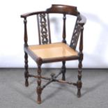 Edwardian oak corner chair.