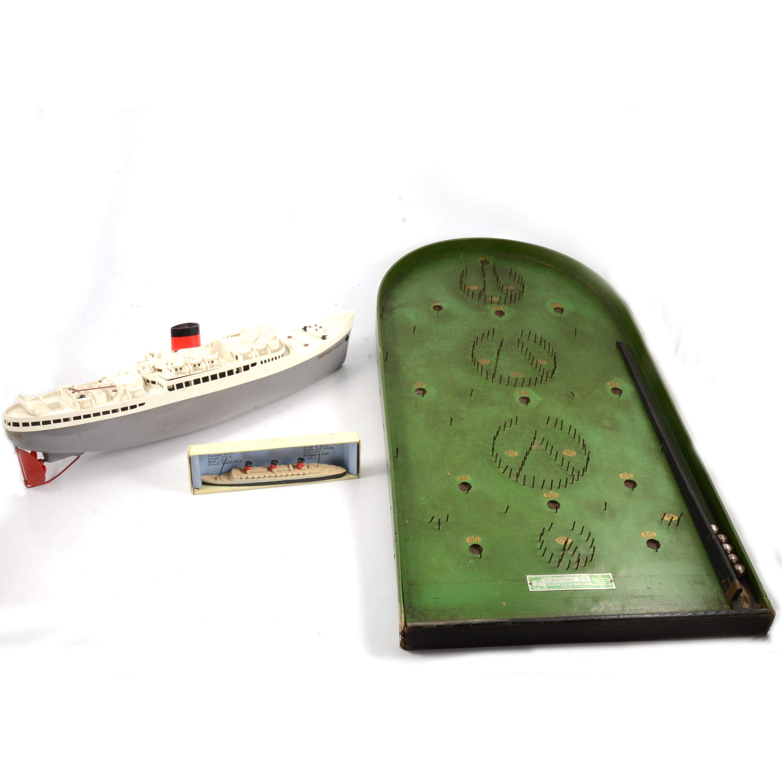 Tri-ang Ocean Liner, Chad Valley boat and a Bagatelle board.