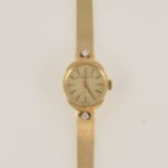Creation Geneve - a lady's quartz 585 standard bracelet watch
