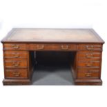 Large Edwardian walnut desk by Howard & Son,