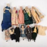 Eleven Victorian Parian and china head miniature doll