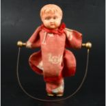 Buschow & Beck, Germany, celluloid head, clock-work skipping doll
