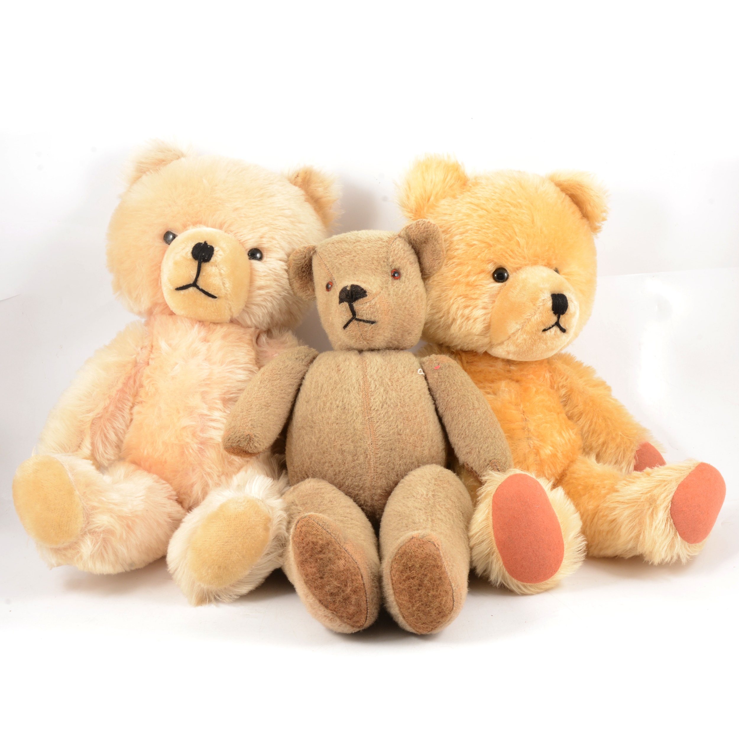 Three mid-century teddy bears.