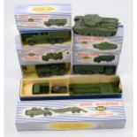 Five Dinky Toys die-cast military models, all boxed.