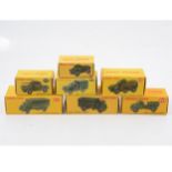 Seven Dinky Toys die-cast military models, all boxed.