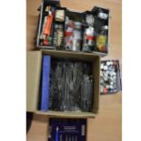 A case of model railway accessories, parts, paints and spares