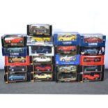 Twenty-one 1:18 scale model cars, all boxed.