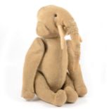 An early 20th century toy straw filled elephant, possibly by Steiff