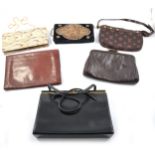 Vintage clutch bags, wallets, coin purses, travelling etui, glove stretchers and compacts.