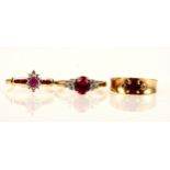 Two ruby and diamond rings, and a pink and white stone ring.