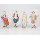 Two pairs of German porcelain figures,