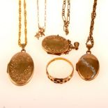 Three lockets, five neckchains and a 15 carat gold ring.