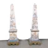 Pair of reproduction obelisks and a stick stand,