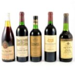 Five bottles of assorted French vintage wines