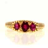 A reproduction Victorian style ruby carved claw ring