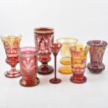 Seven Bohemian glass beakers and vases,