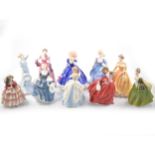 Ten Royal Doulton lady figures,
