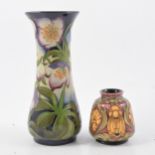 Moorcroft Pottery Festive Friends vase and Queen Bee Talents of Windsor vase.