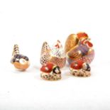 Five Royal Crown Derby paperweights, cockerel and hen, bird, two ladybirds.