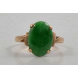 A jadeite dress ring.