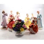 Eight Royal Doulton and Royal Worcester figurines, and an Aynsley posy.