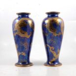 A pair of Wedgwood Dragon lustre vases designed by Daisy Makeig-Jones.