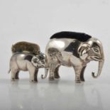 Two Edwardian silver novelty pin cushions, designed as elephants