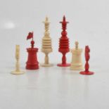 A stained bone chess set, all present, some slight losses.