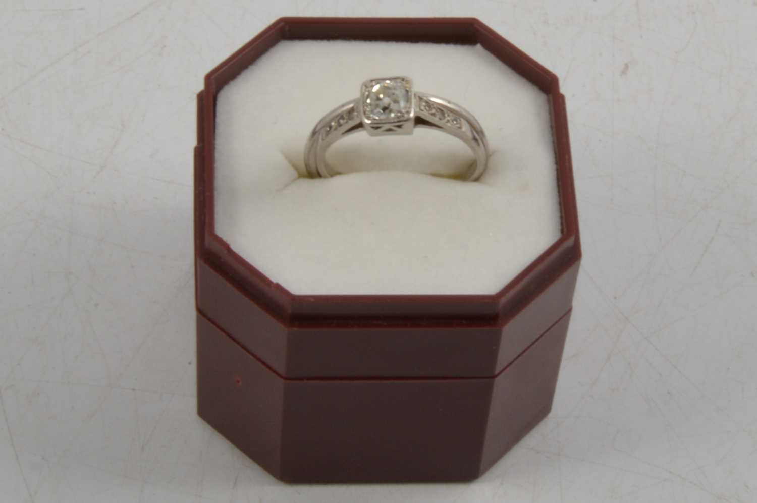 An old cut diamond ring and a wedding ring.