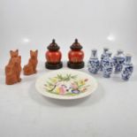Three terracotta seated cats, five small blue and white double gourd vases,