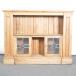 Pine cupboard with glass doors.