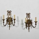 Pair of gilt metal twin arm wall lights.