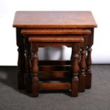 Nest of three oak coffee tables,