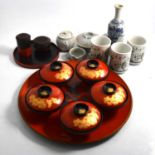 Two Japanese turned wood bowls, and other Japanese artefacts.