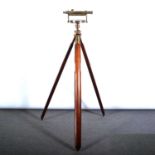 Brass theodolite on a tripod stand,