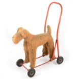 International Model Aircraft ltd, Tri-ang push-a-long dog toy on wheels and steel stand.