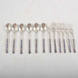 Set of six Japanese white metal spoons and forks.